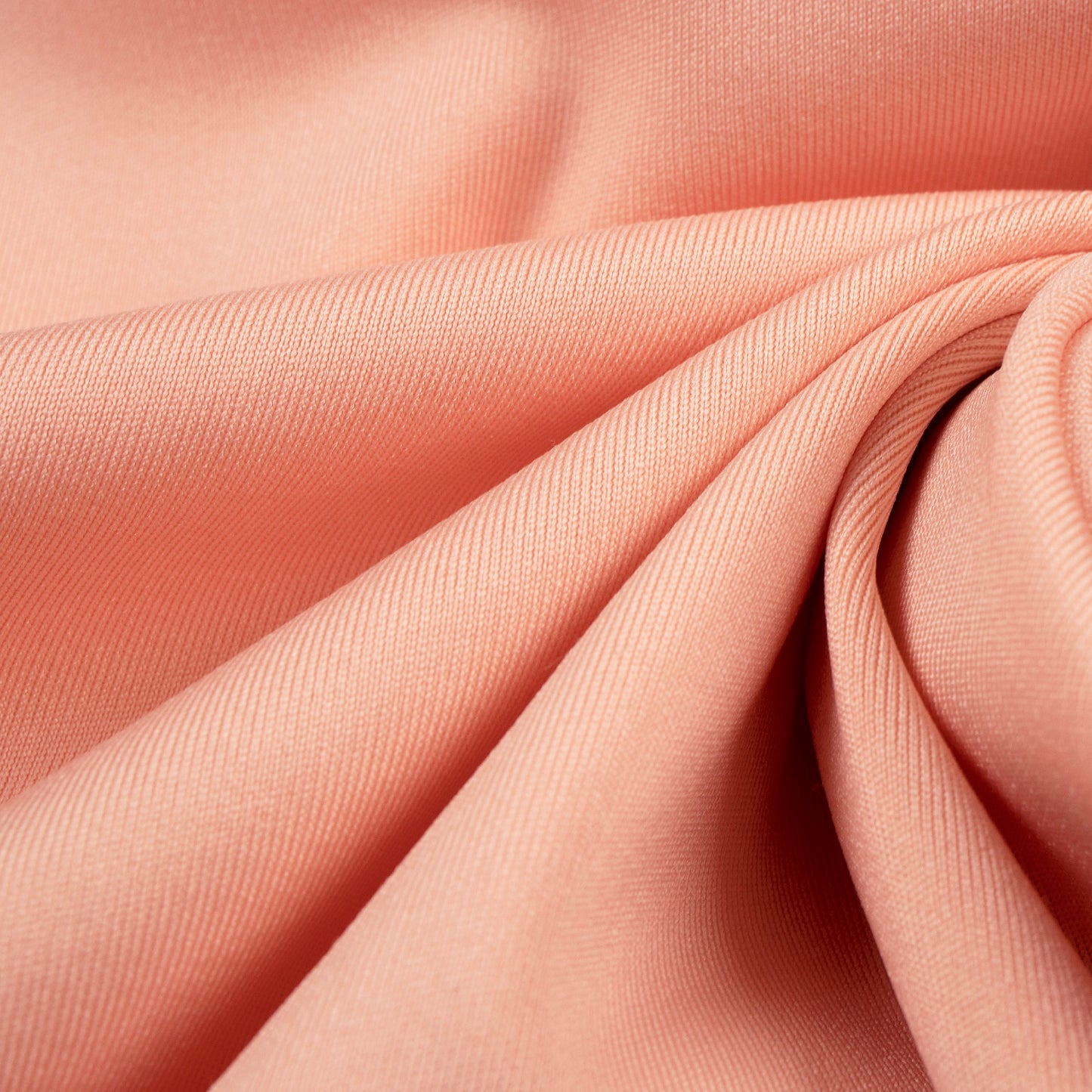 Sleek And Stretchy: Peachy Pink Plain Lycra Fabric (Width 58 Inches)