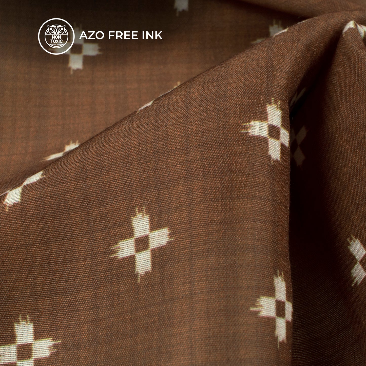 Burnt Umber Ikkat Digital Print Muslin Fabric