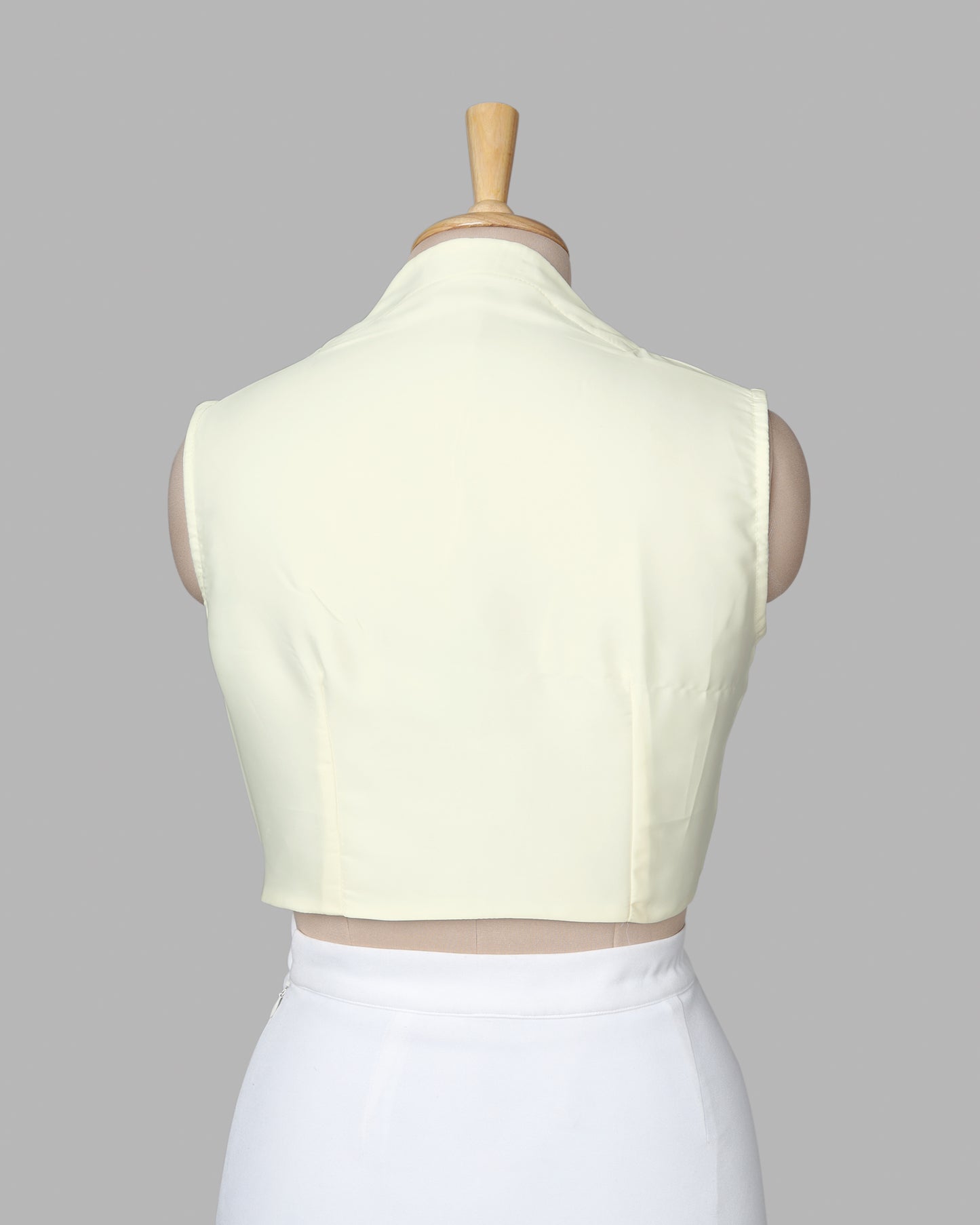 Off White Plain Sleeveless V-Neck Blouse