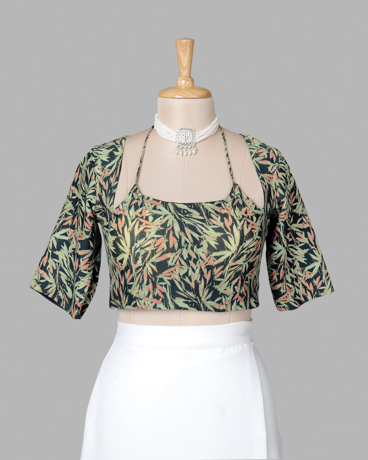 Black And Tea Green Leaf Tie Up Neck Cotton Blouse