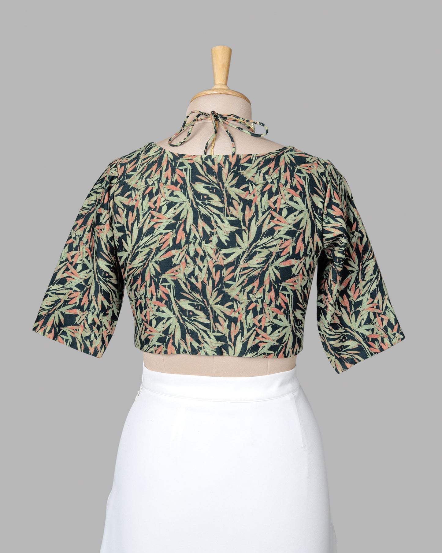 Black And Tea Green Leaf Tie Up Neck Cotton Blouse