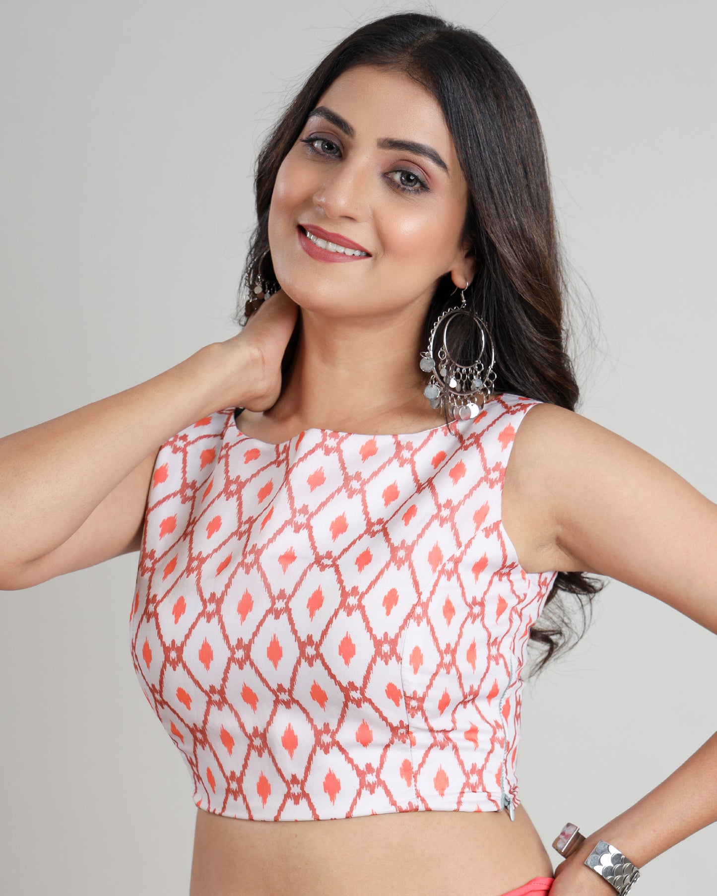 A Twist On Tradition: Trendy Sleeveless Ikkat Print Blouse