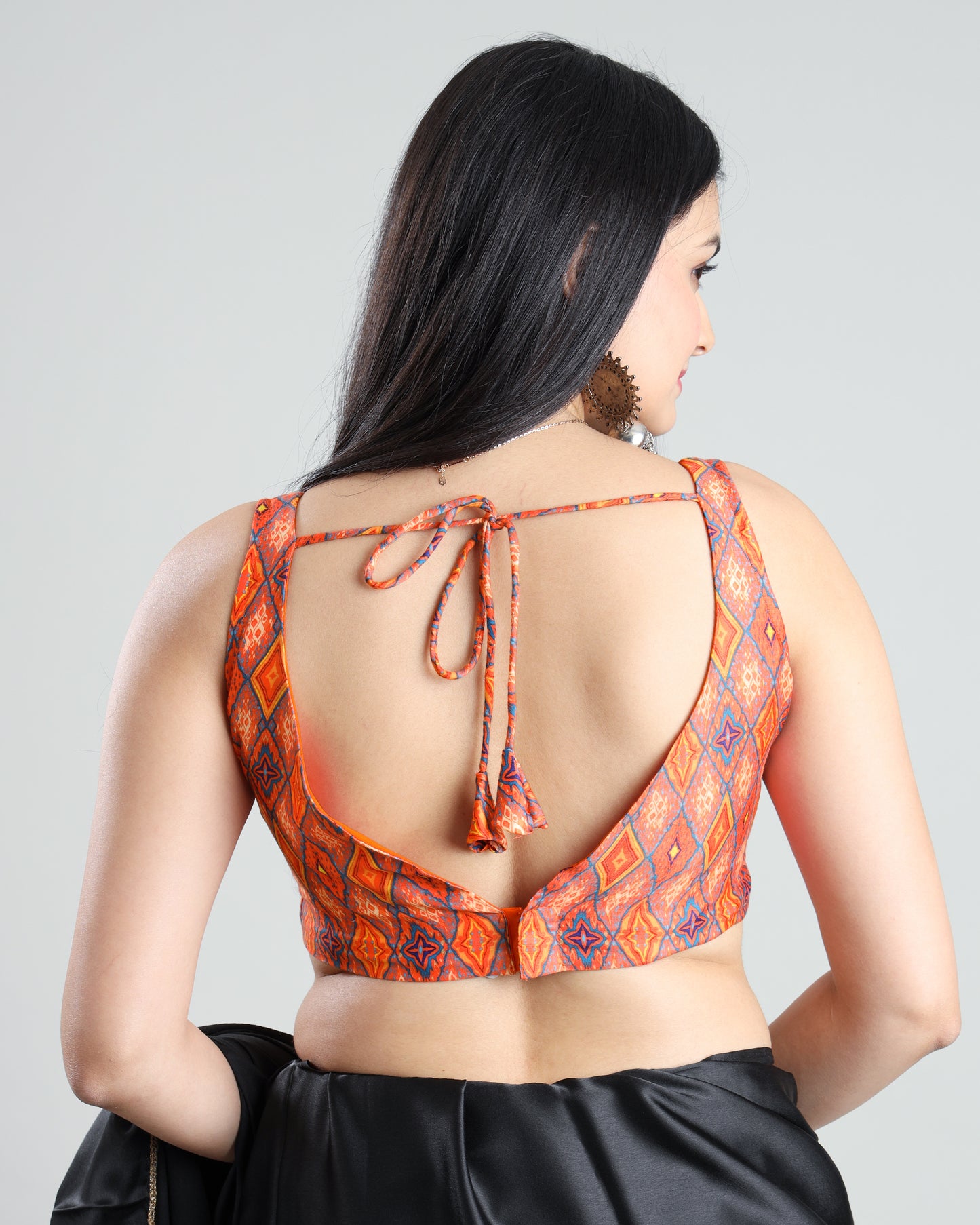 Cool And Chic Sleeveless Ikkat Print Blouse