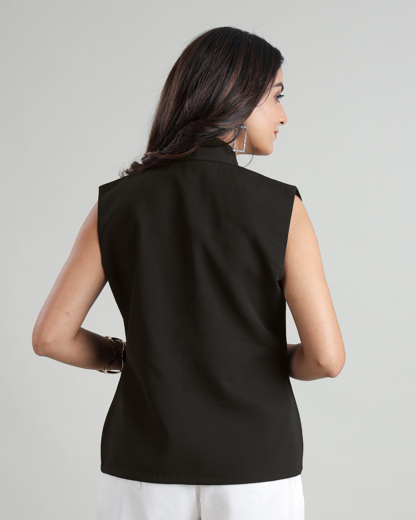 Dress to Empower: The Power Statement Sleeveless Jacket