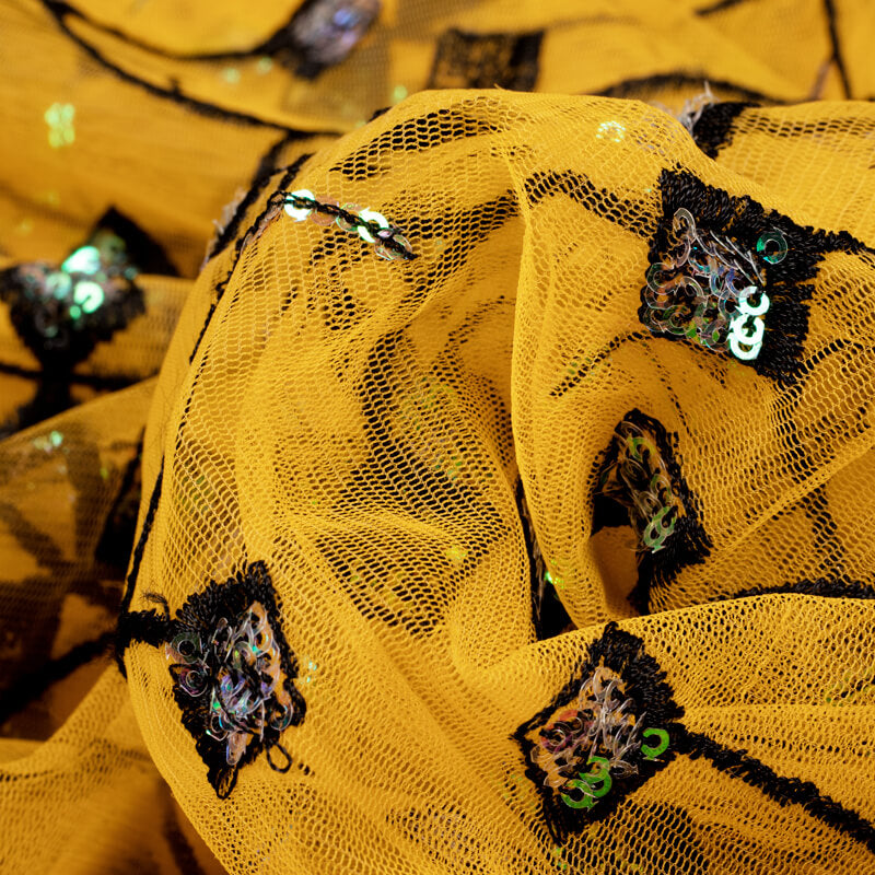 Yellow And Black Ethnic Pattern Embroidery Sequince Net Fabric - Fabcurate