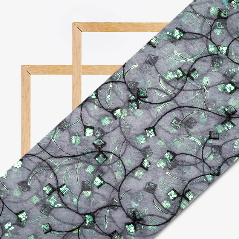 Grey And Black Ethnic Pattern Embroidery Sequince Net Fabric - Fabcurate