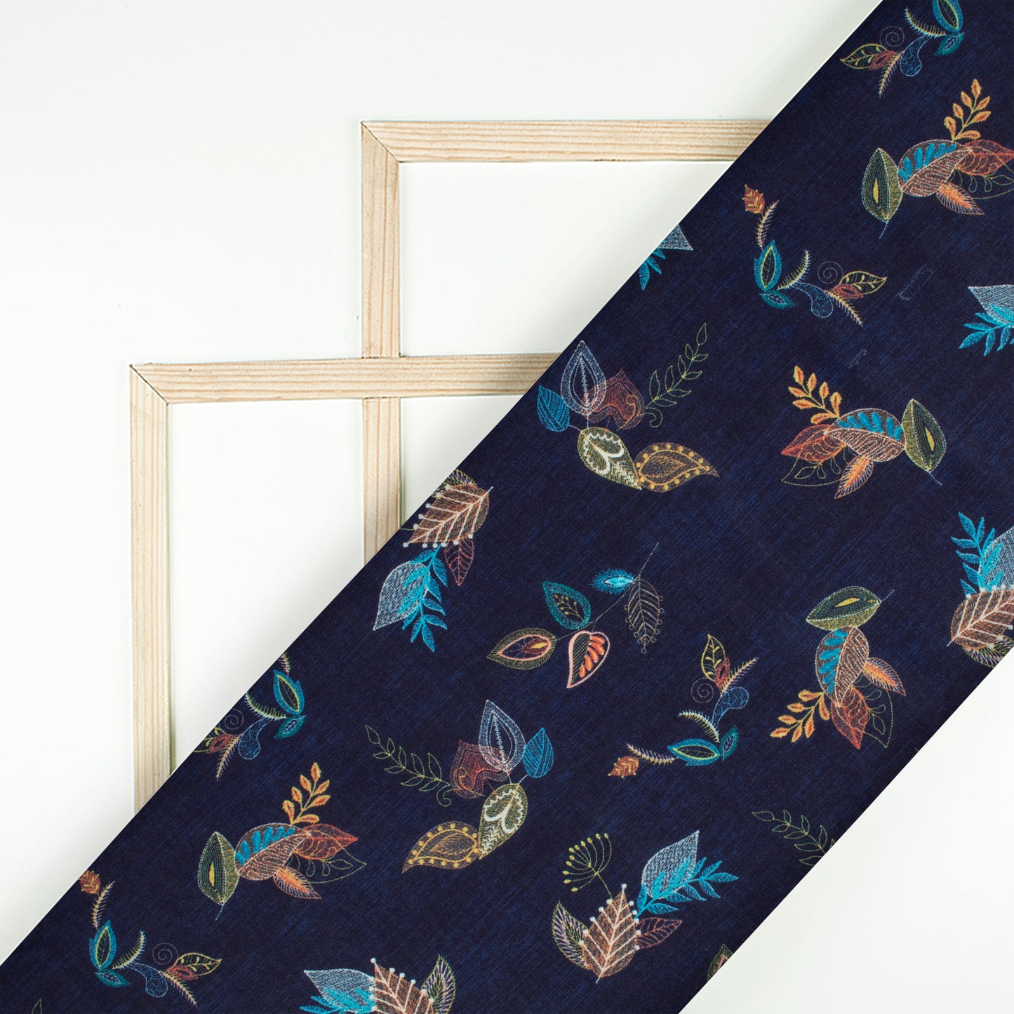 Navy Blue And Orange Leaf Pattern Digital Print Muslin Fabric