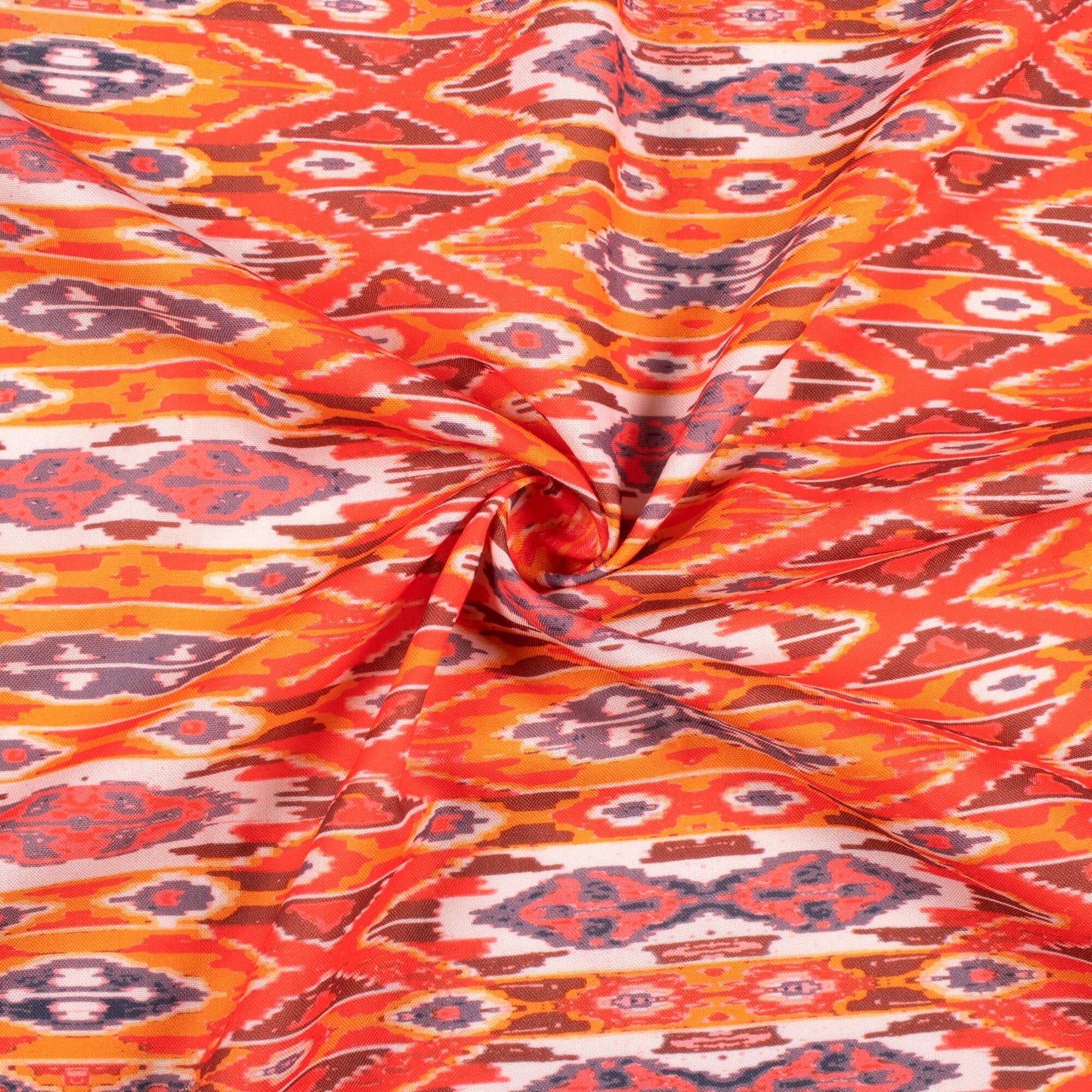 Orange And Red Ikkat Pattern Digital Print Rayon Fabric