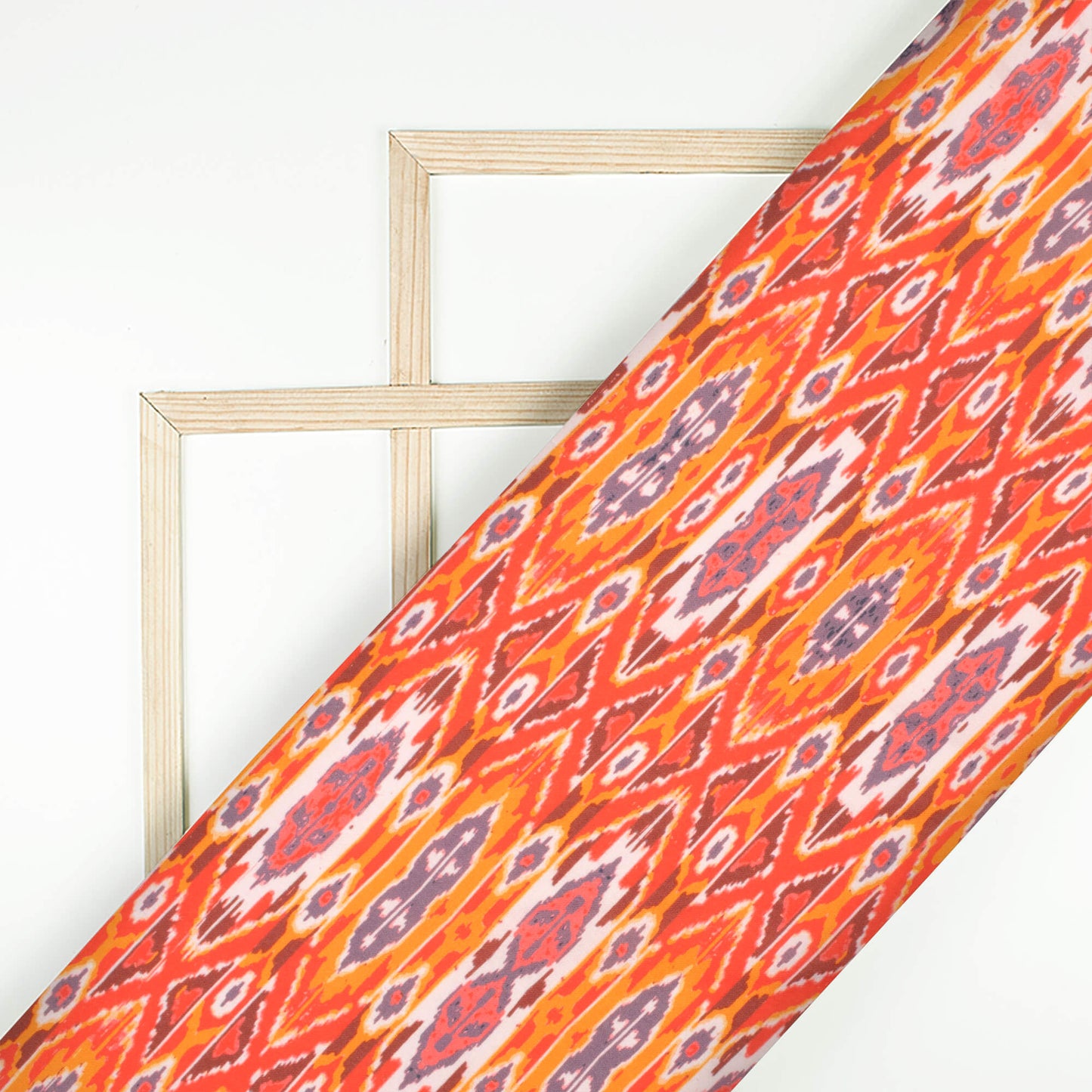 Orange And Red Ikkat Pattern Digital Print Rayon Fabric