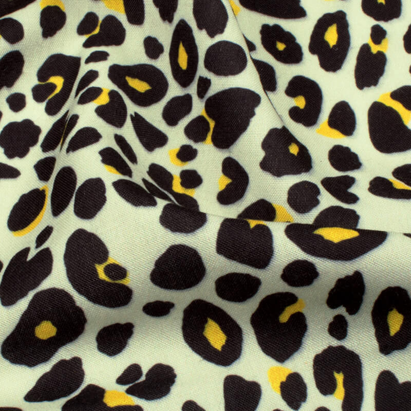 Black And Cotton Cream Animal Digital Print Rayon Fabric - Fabcurate