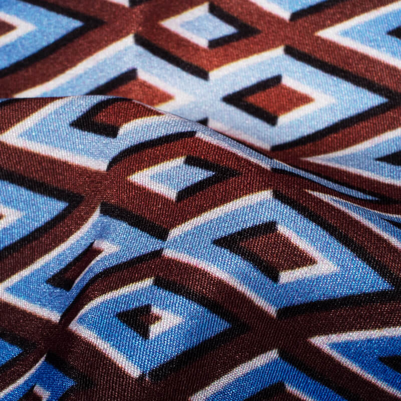 Royal Blue And Cinnamon Brown Geometric Pattern Illusion Digital Print Crepe Silk Fabric - Fabcurate
