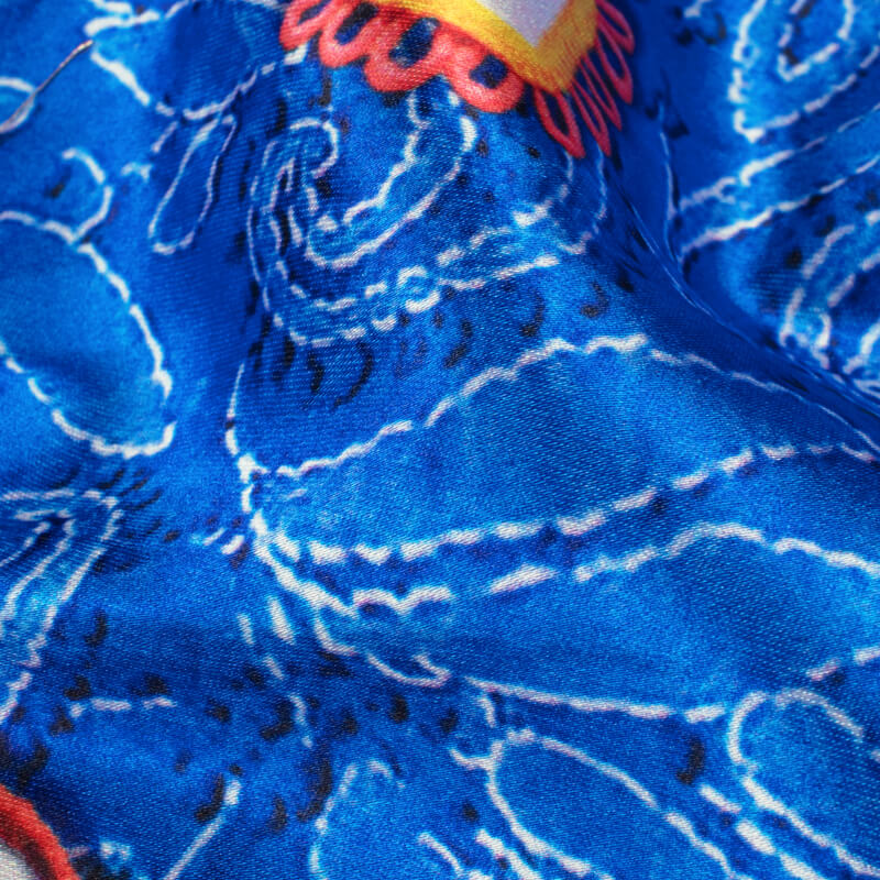Royal Blue And Coral Peach Gamthi Pattern Digital Printed Japan Satin Fabric - Fabcurate