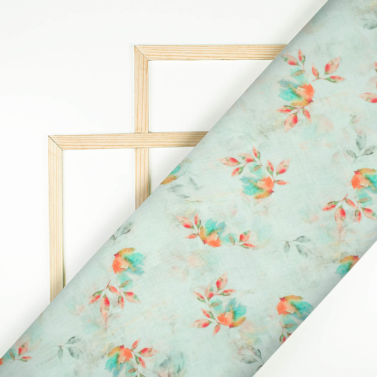 Pale Blue And Orange Leaf Pattern Digital Print Pure Cotton Mulmul Fabric - Fabcurate