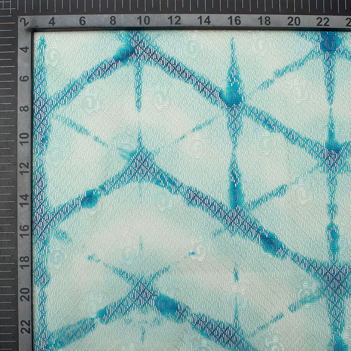 Sapphire Blue And Off White Abstract Pattern Digital Print Booti Raschel Net Fabric (Width 58 Inches)