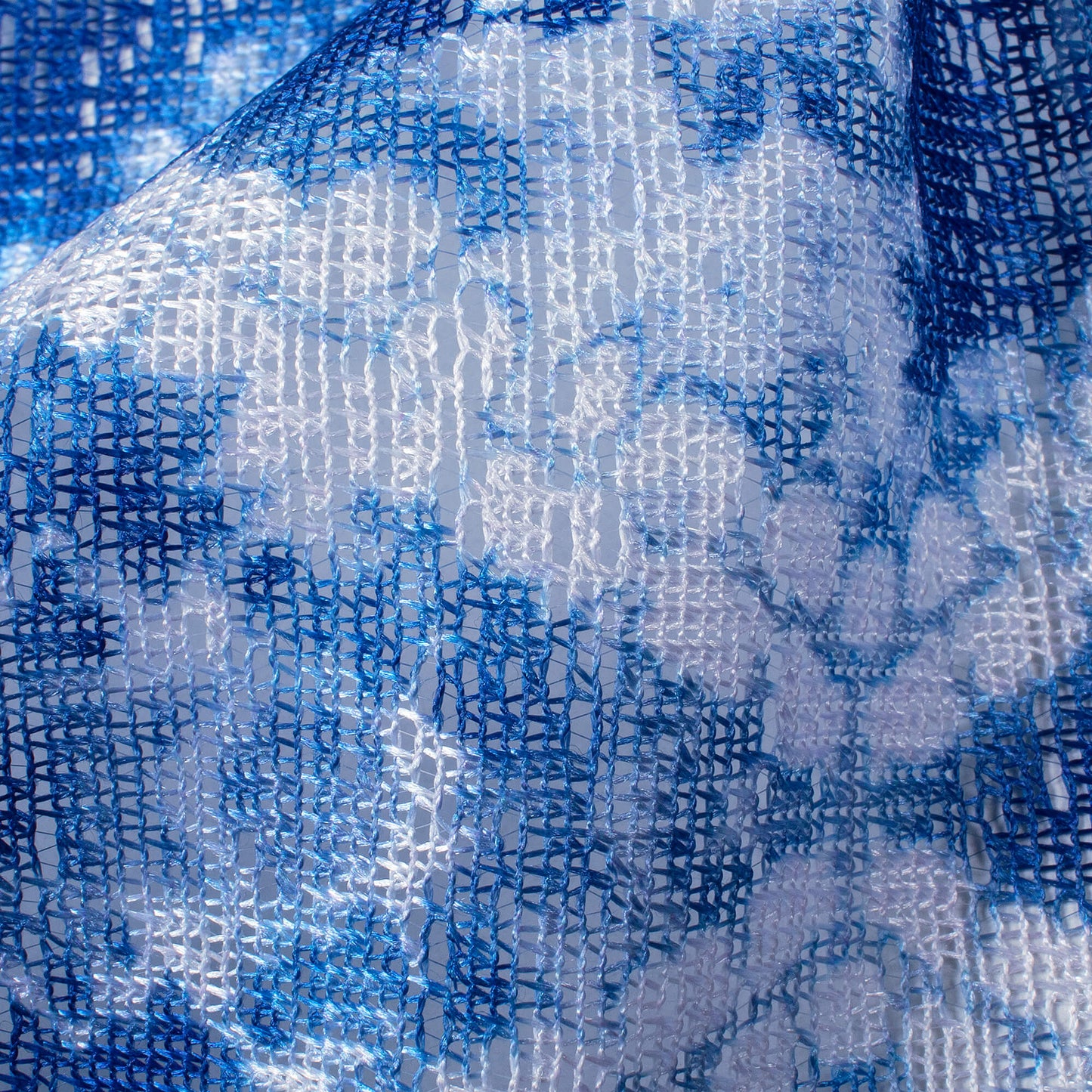 Yale Blue And White Shibori Pattern Digital Print Raschel Net Fabric (Width 58 Inches)