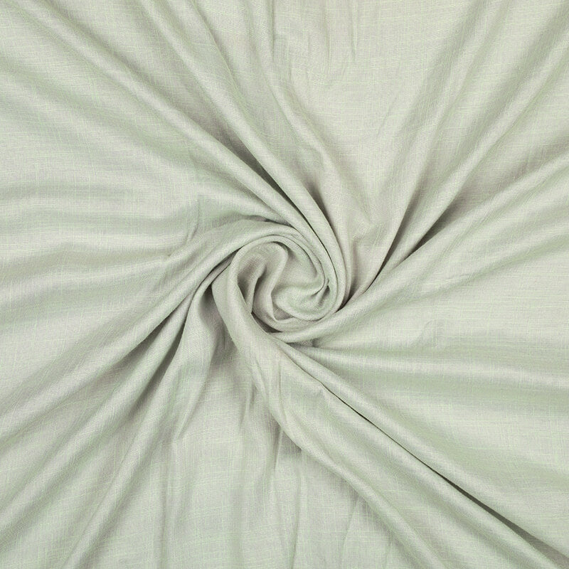 Light Pistachio Green And Light Pink Weaved Dual Tone Plain Rayon Slub Fabric - Fabcurate