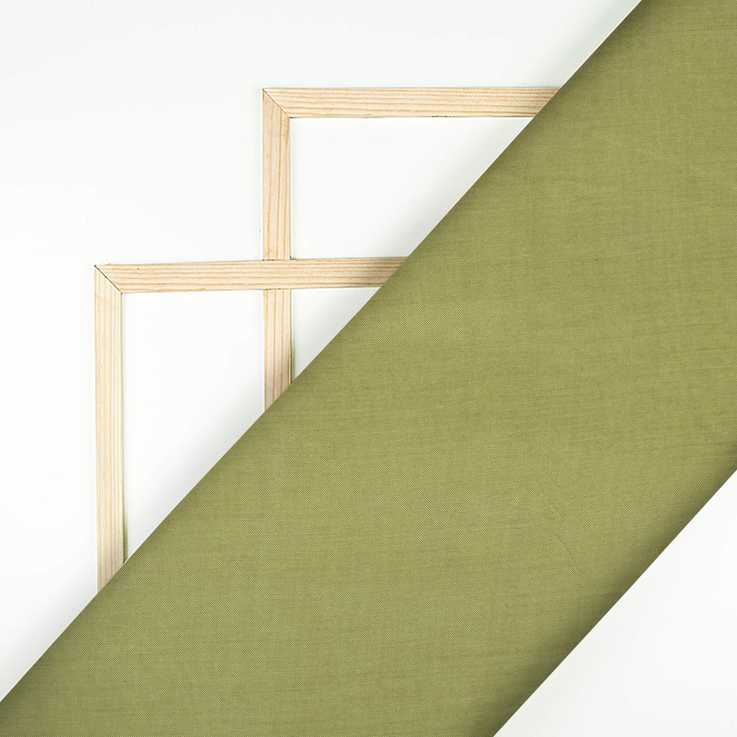 Pistachio Green Plain Pure Muslin Fabric - Fabcurate