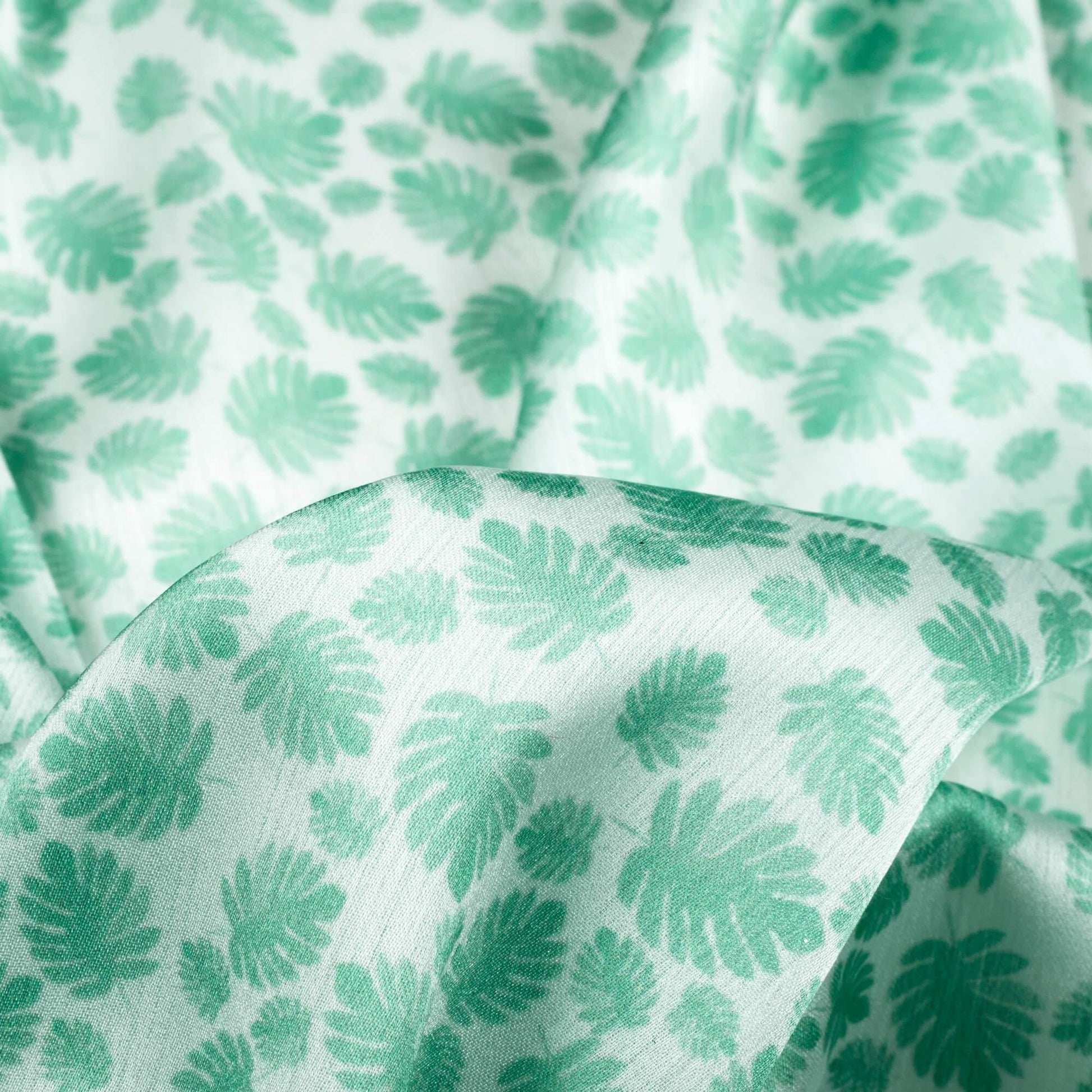 Krutika's Choice White And Sea Green Leaf Pattern Digital Print Chiffon Satin Fabric - Fabcurate