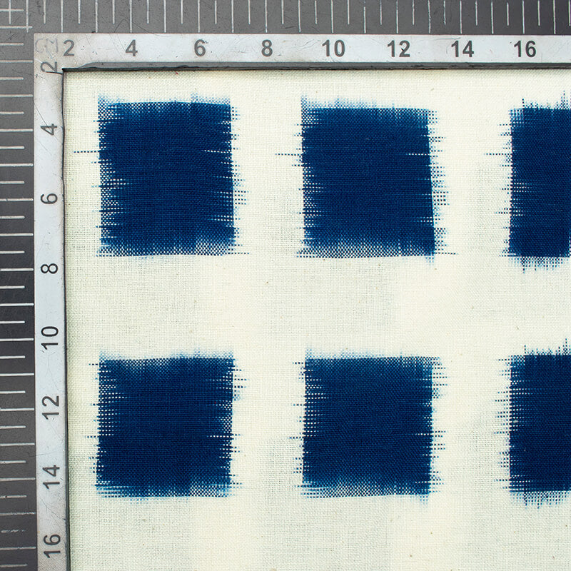 White And Navy Blue Geometric Pattern Pre-Washed Double Ikat Cotton Fabric - Fabcurate