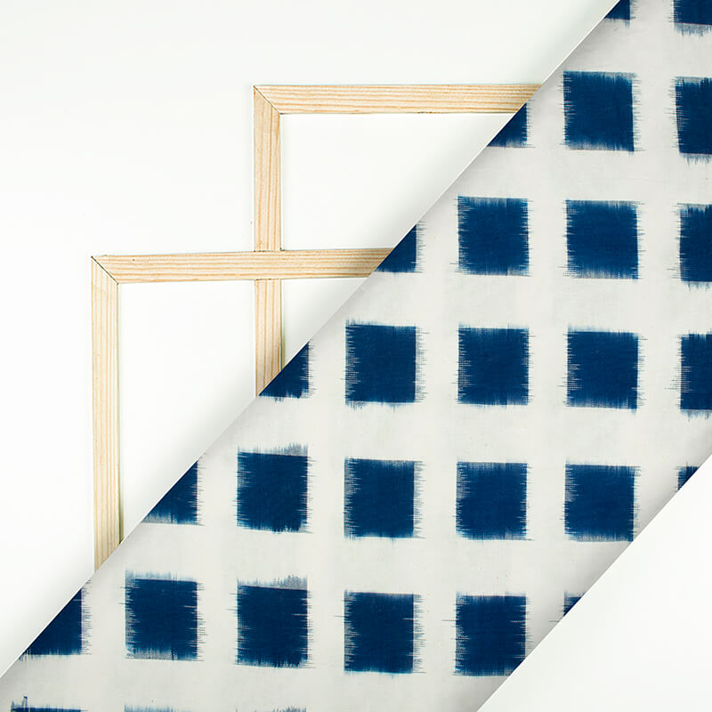 White And Navy Blue Geometric Pattern Pre-Washed Double Ikat Cotton Fabric - Fabcurate