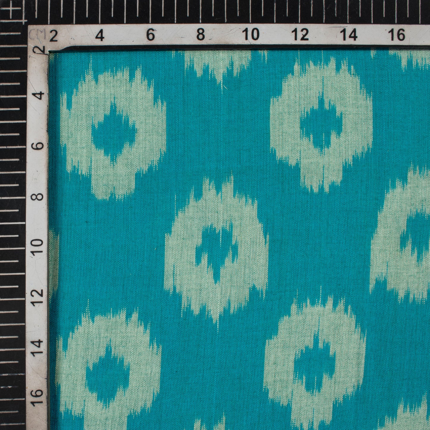 Teal Blue And Snow White Geometric Pattern Pre-Washed Mercerised Ikat Cotton Fabric - Fabcurate