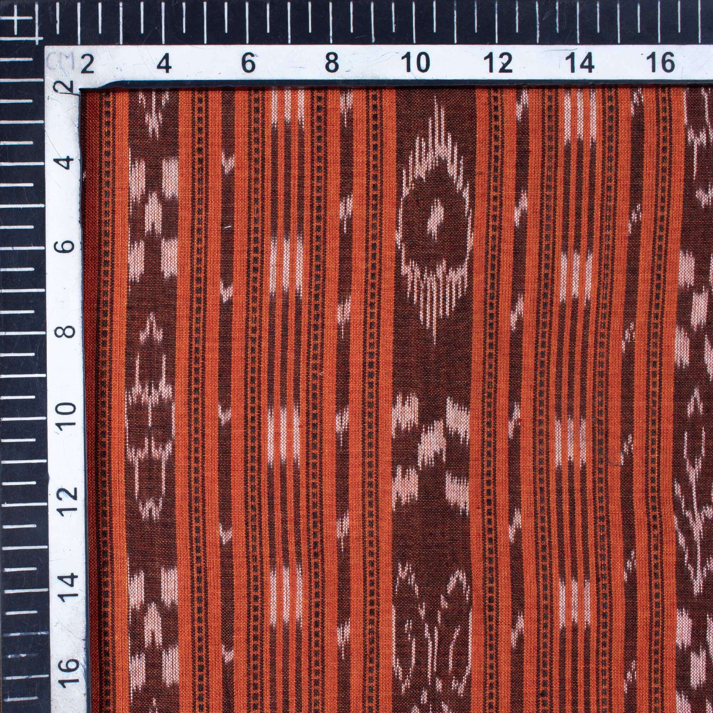 Burnt Orange Stripes Pattern Loom Textured Pre-Washed Mercerised Sambhalpuri Ikat Cotton Fabric - Fabcurate