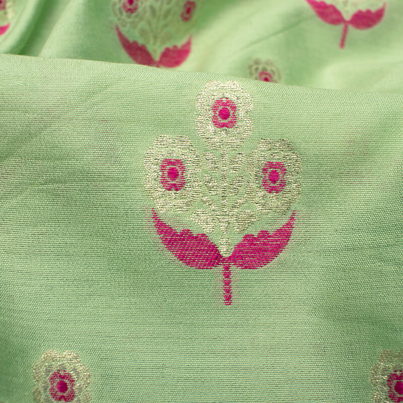 Pastel Green And Punch Pink Floral Pattern Zari Jacquard Banarasi Muga Silk Fabric - Fabcurate