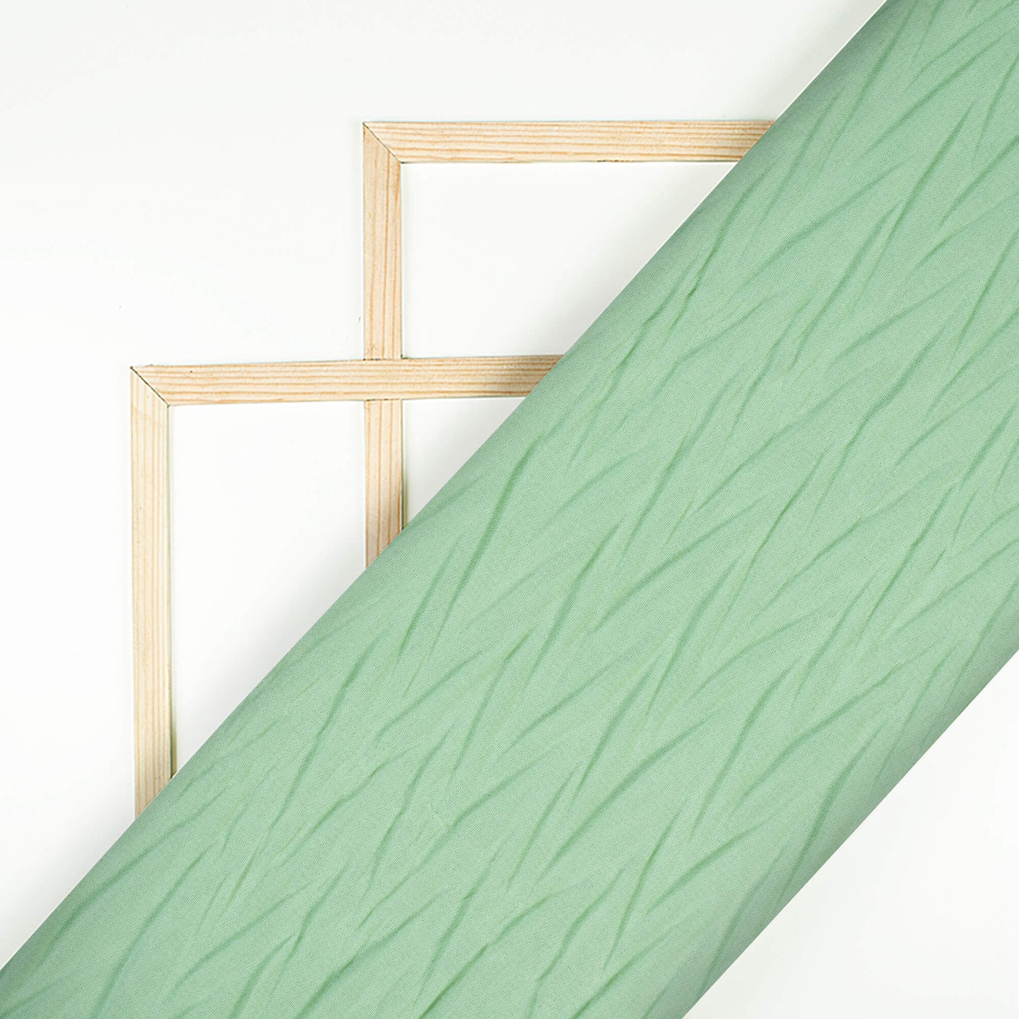 Surf Green Plain Georgette Pleated Fabric - Fabcurate