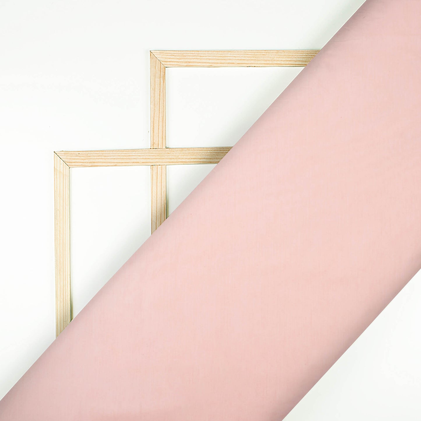 Salmon Pink Plain Cotton Mulmul Fabric - Fabcurate
