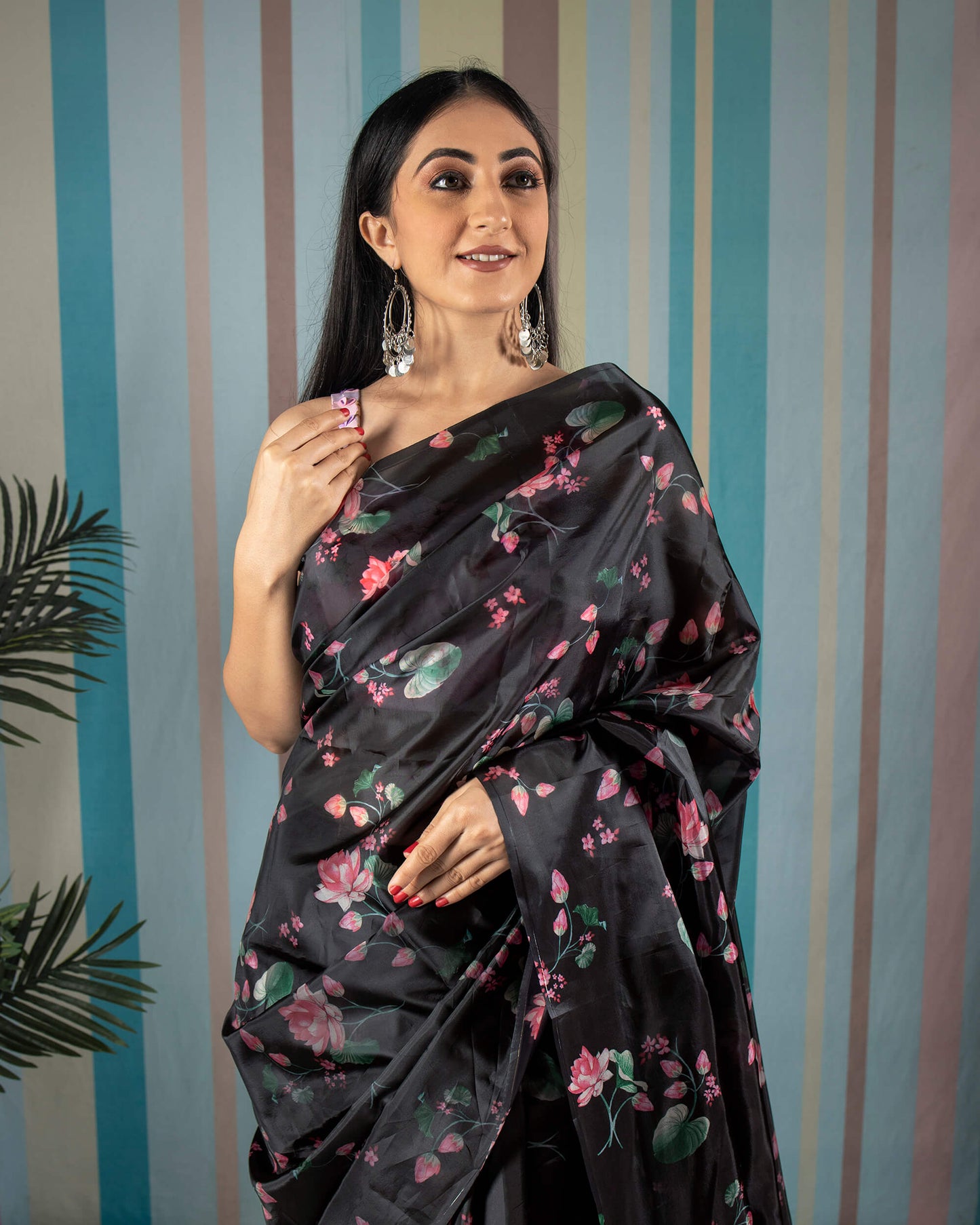 Black And Pink Floral Pattern Liquid Organza Saree With Tassels