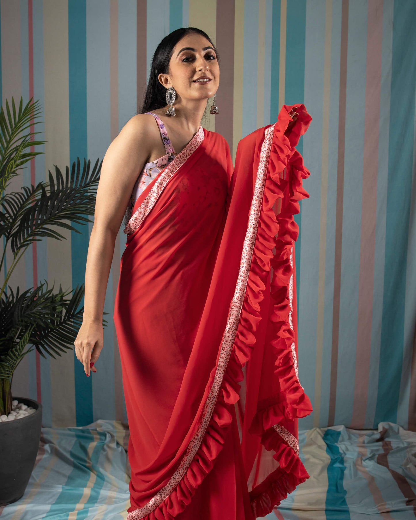 Red Plain Georgette Ruffle Saree With Printed Satin Border