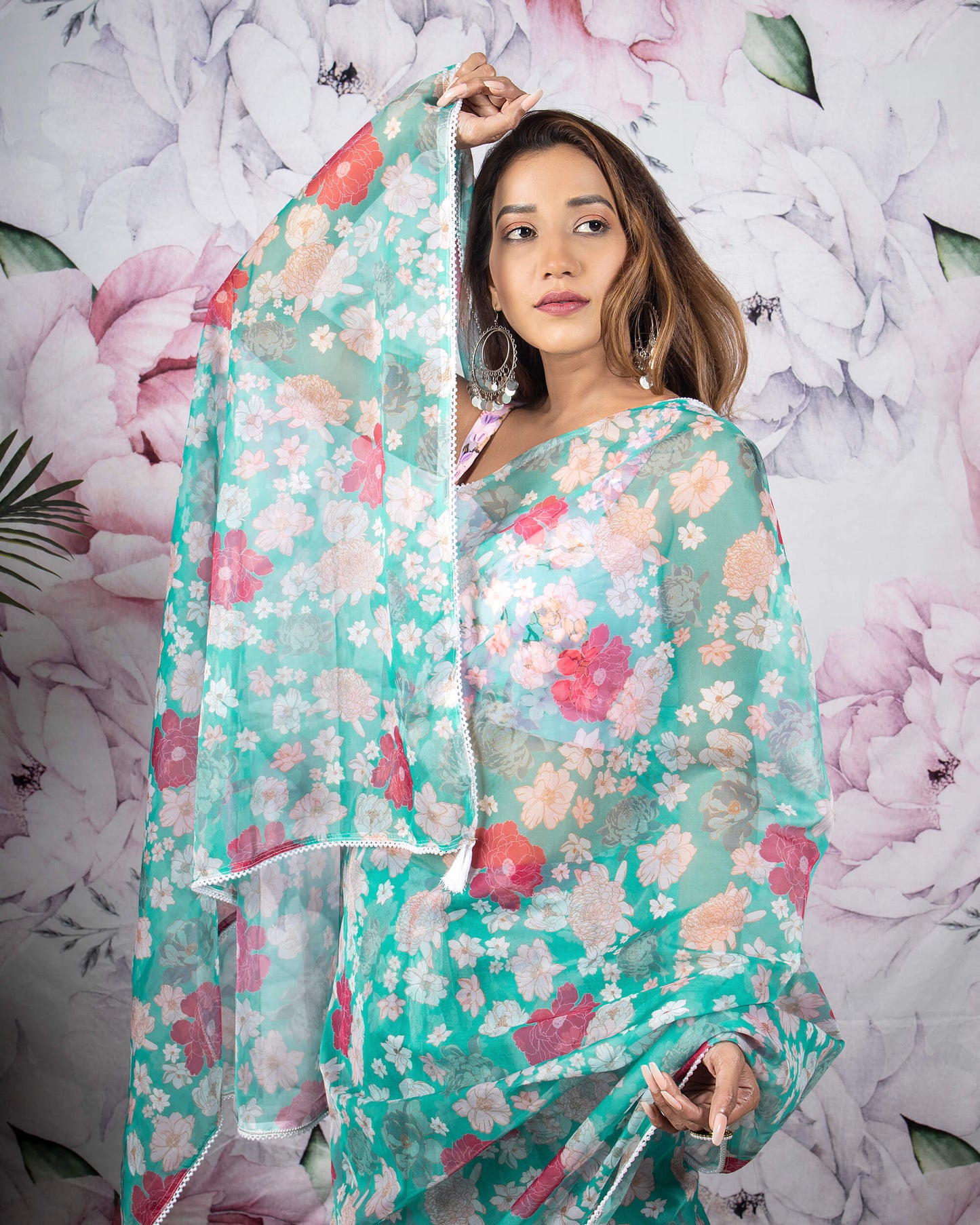 Tuquoise And Pink Floral Pattern Organza Saree With Pearl Work Lace Border