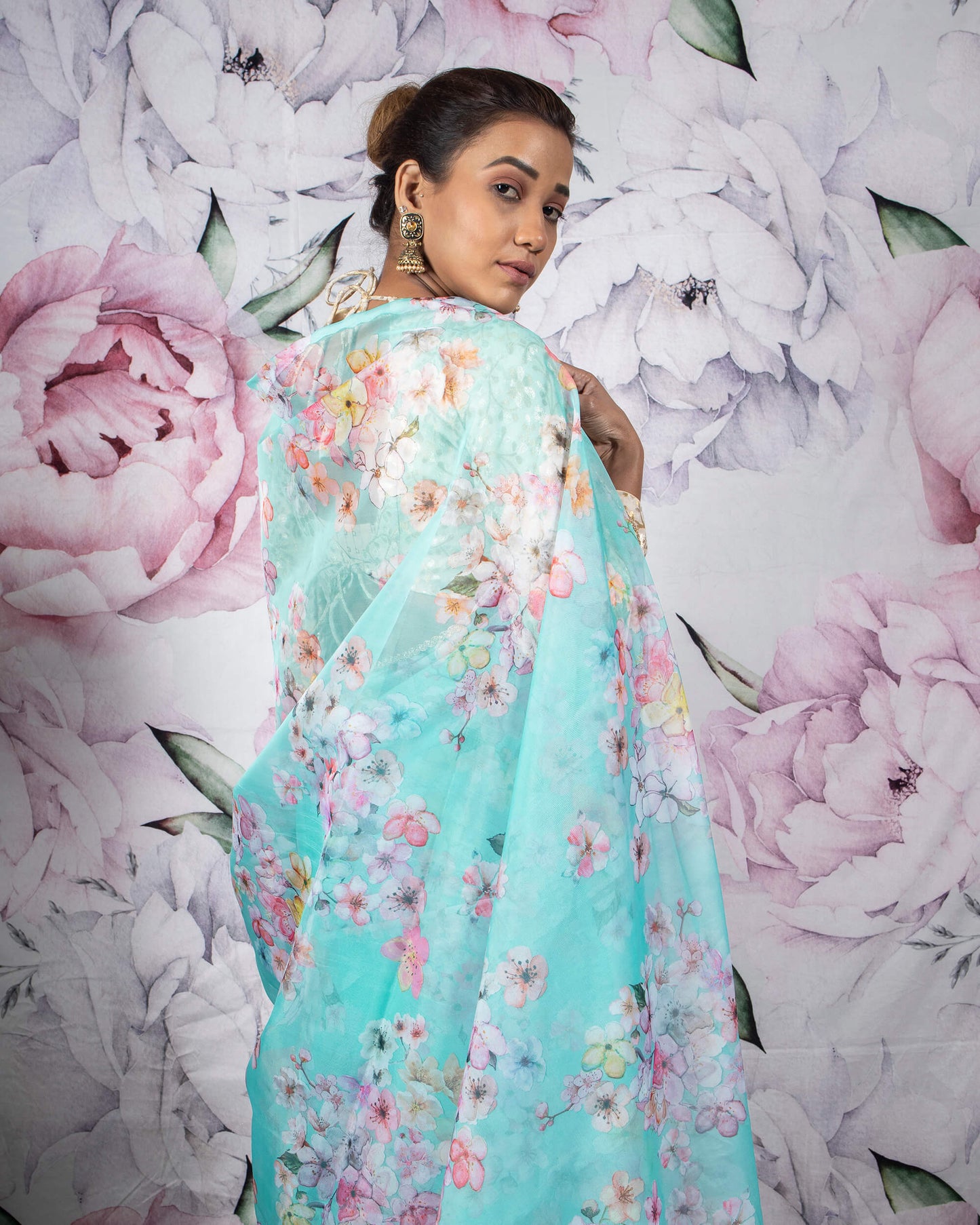 Celeste Blue And Pink Floral Pattern Organza Saree With Zari Lace Border