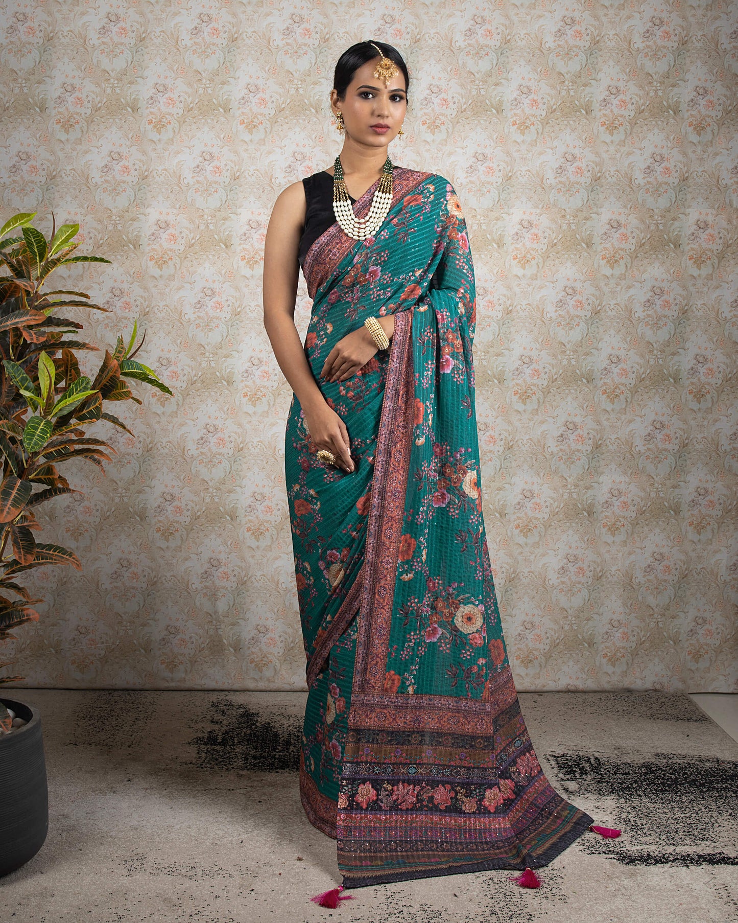 Sea Green And Pink Floral Pattren Sequins Georgette Saree With Tassels