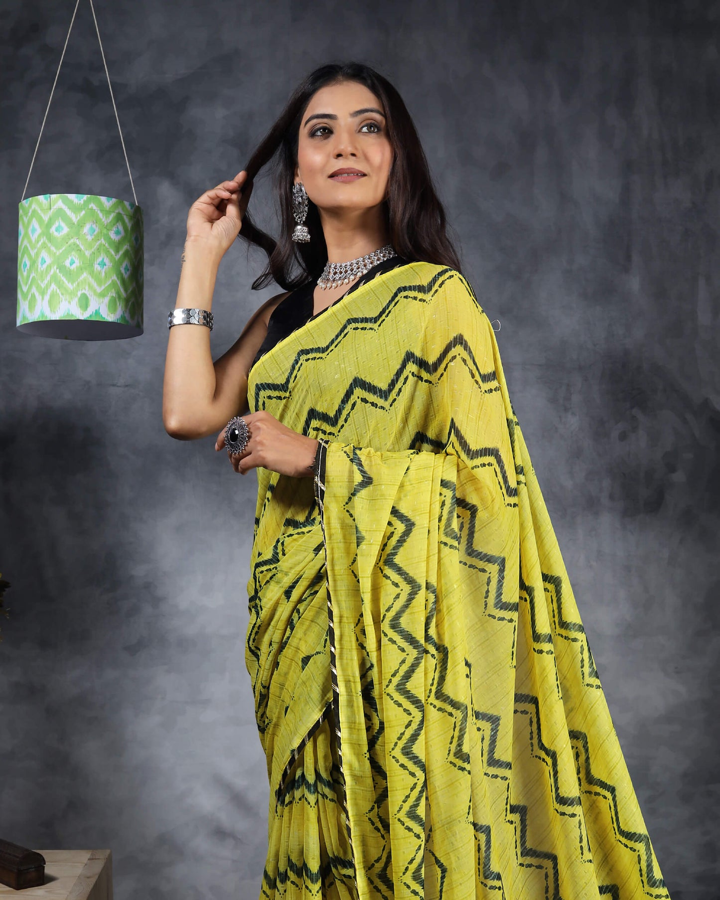 Lemon Yellow And Black Chevron Pattern Digital Print Water Lurex Chiffon Saree With Gota Patti Lace Border