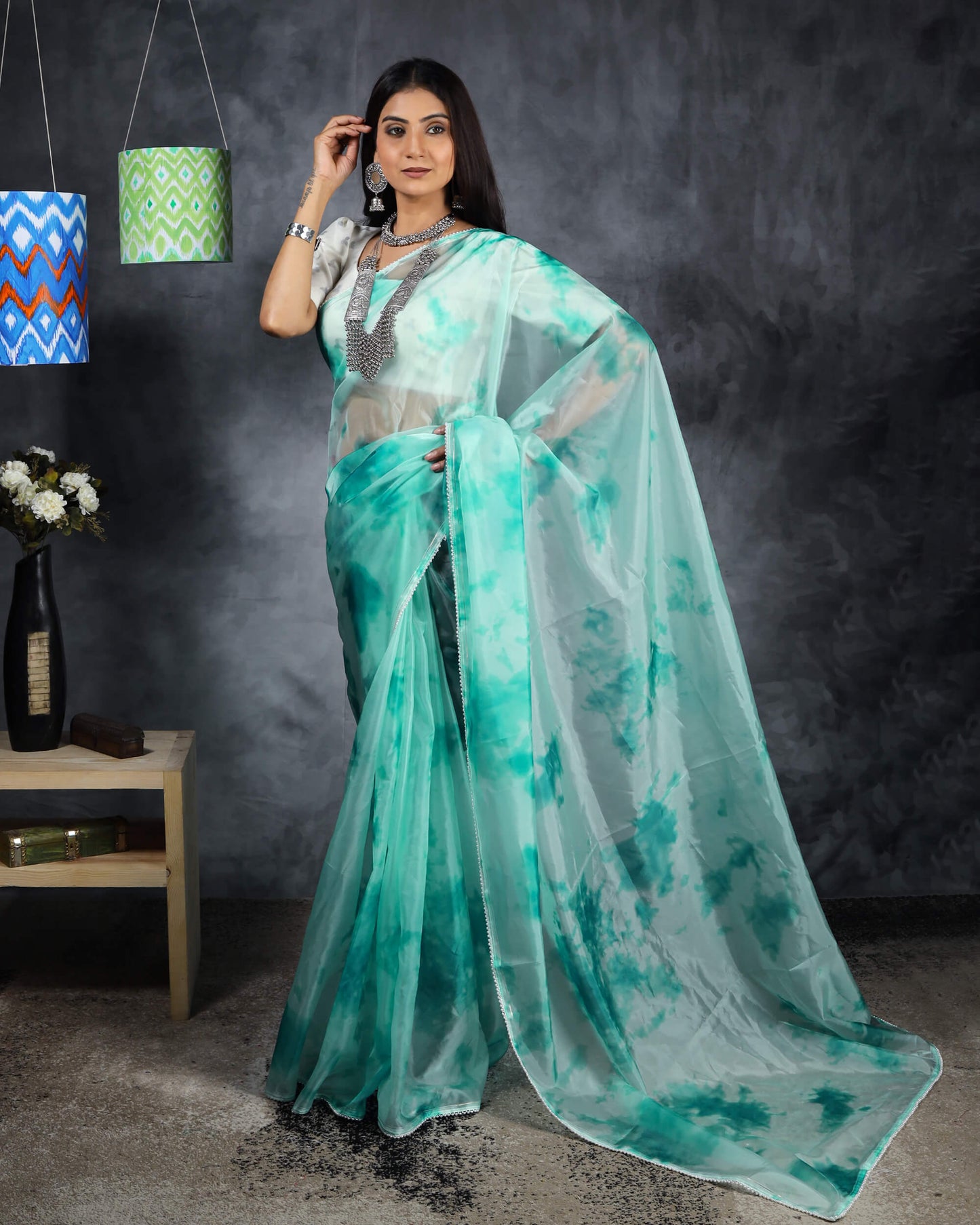 Pale Blue Tye And Dye Pattern Liquid Organza Saree With Pearl Work Lace Border