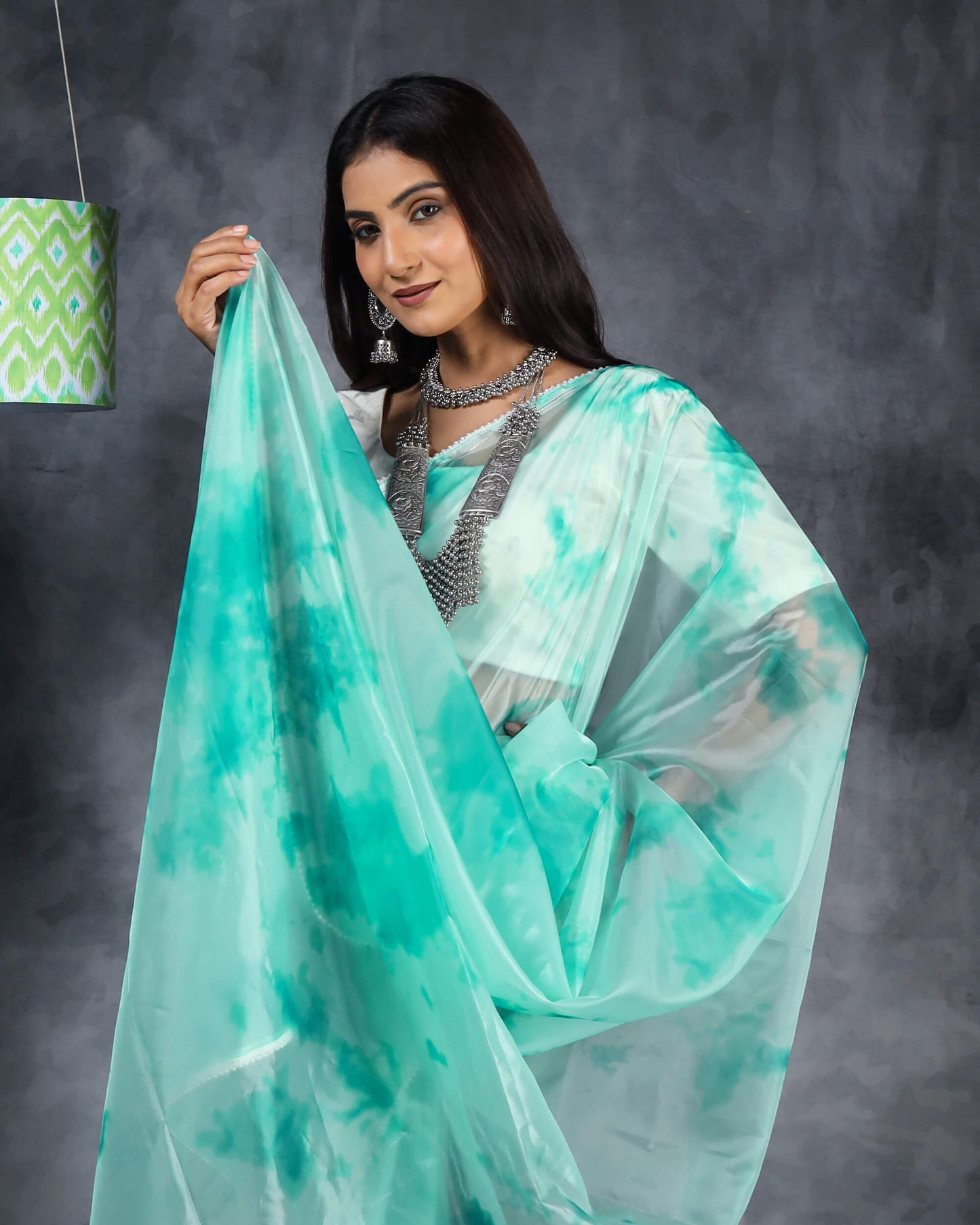Pale Blue Tye And Dye Pattern Liquid Organza Saree With Pearl Work Lace Border