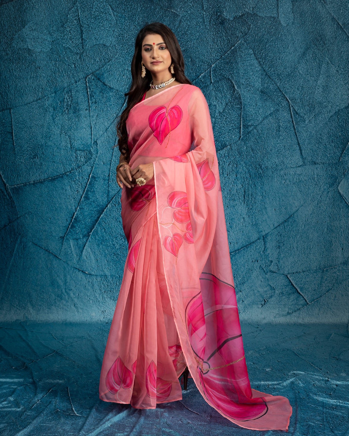 Salmon Pink And Black Leaf Pattern Organza Saree