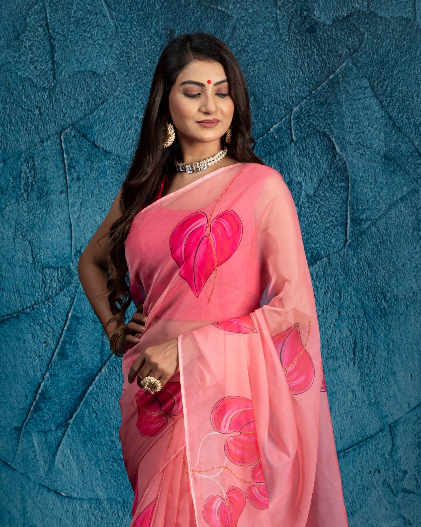 Salmon Pink And Black Leaf Pattern Organza Saree