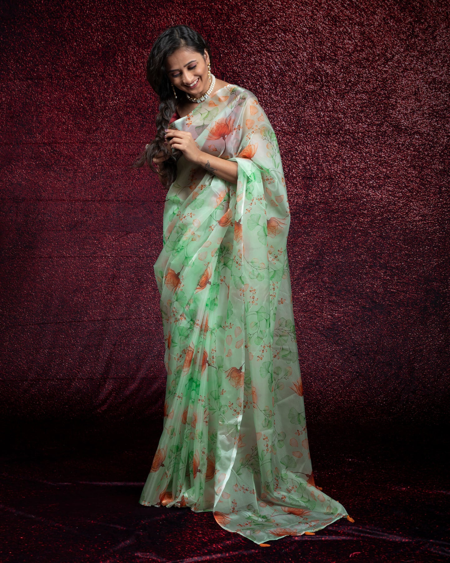 Mint Green and Rust Orange Floral Pattern Digtal Print Liquid Organza Saree With Tassles