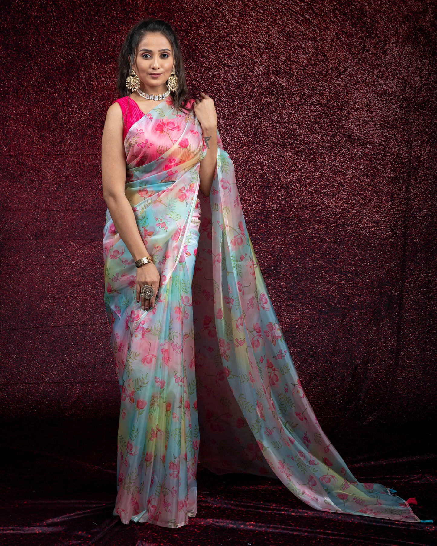 Pastel Blue and Rust Orange Floral Pattern Digtal Print Liquid Organza Saree With Tassles