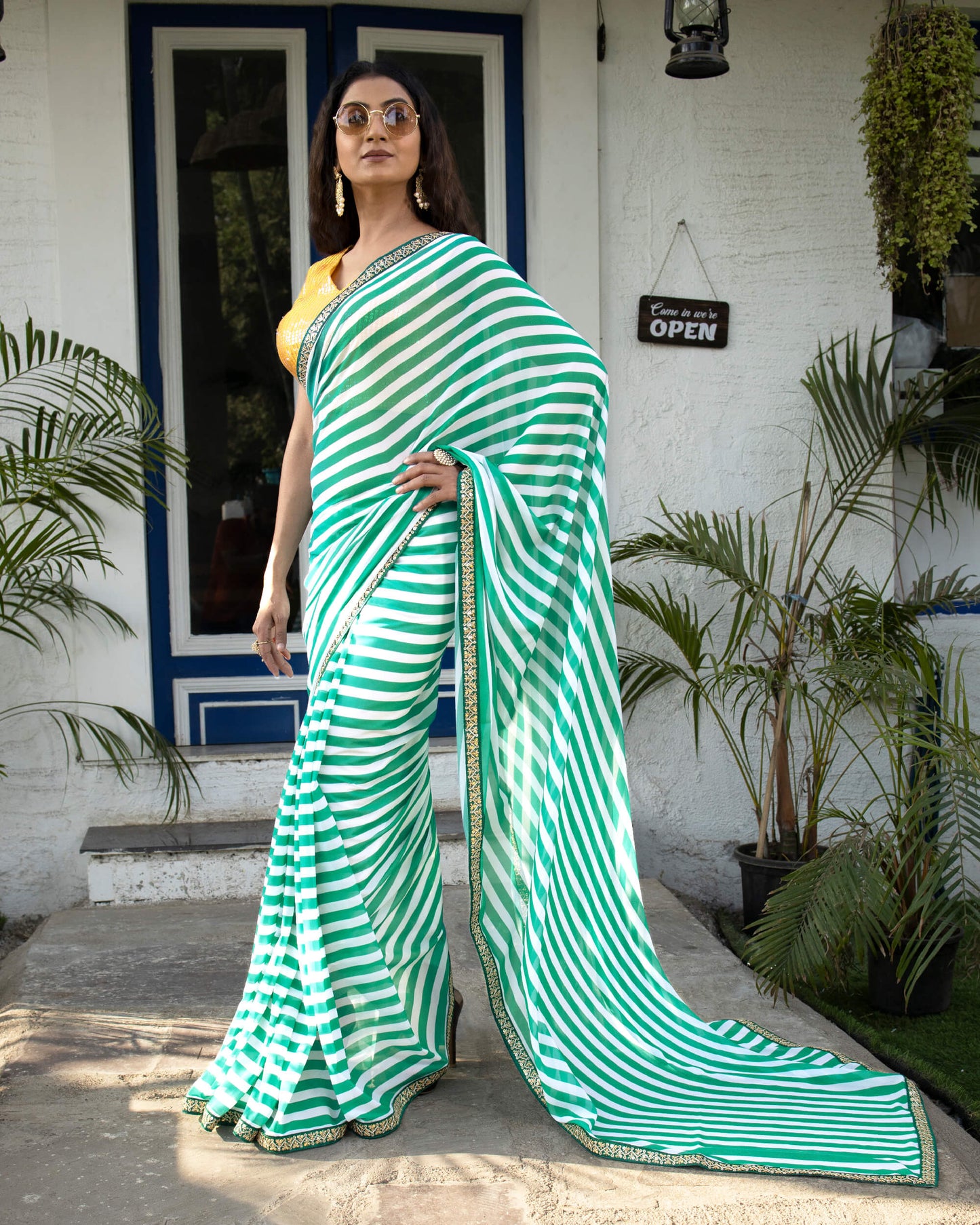 Jungle Green And White Stripes Pattern Digital Print Georgette Saree With Zari Sequins Lace Border