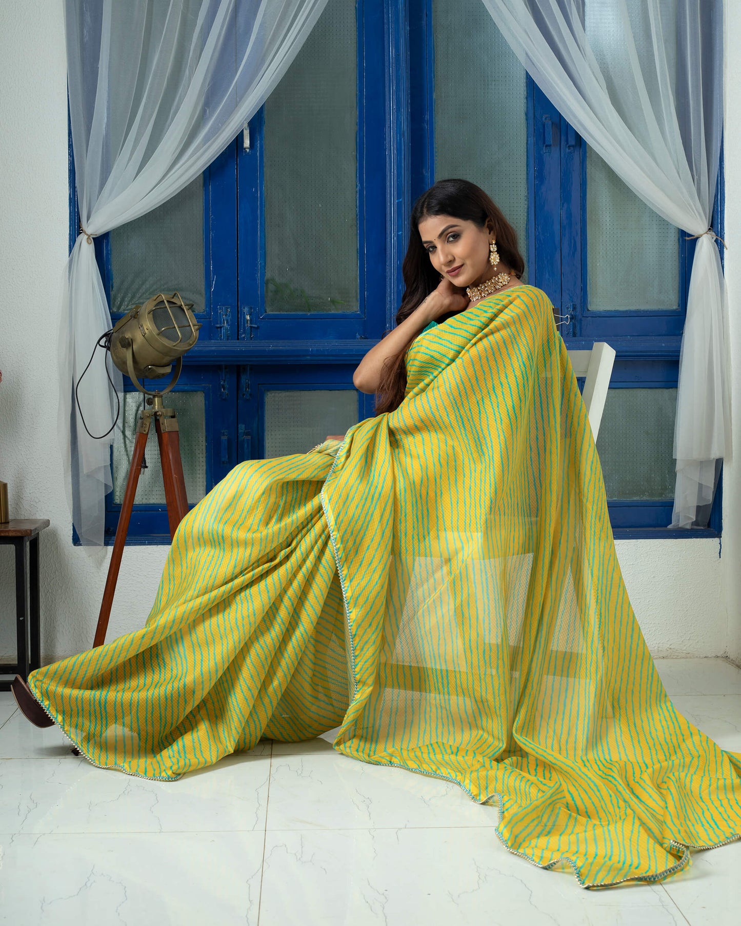 Mustard Yellow And Turquoise Leheriya Pattern Digital Print Kota Doria Saree With Zari Lace Border