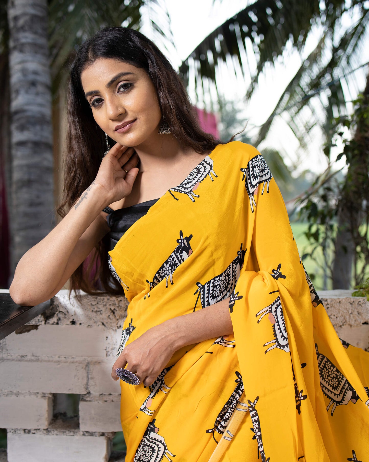 Gold Yellow And Black Animal Pattern Digital Print Natural Crepe Saree With Tassels