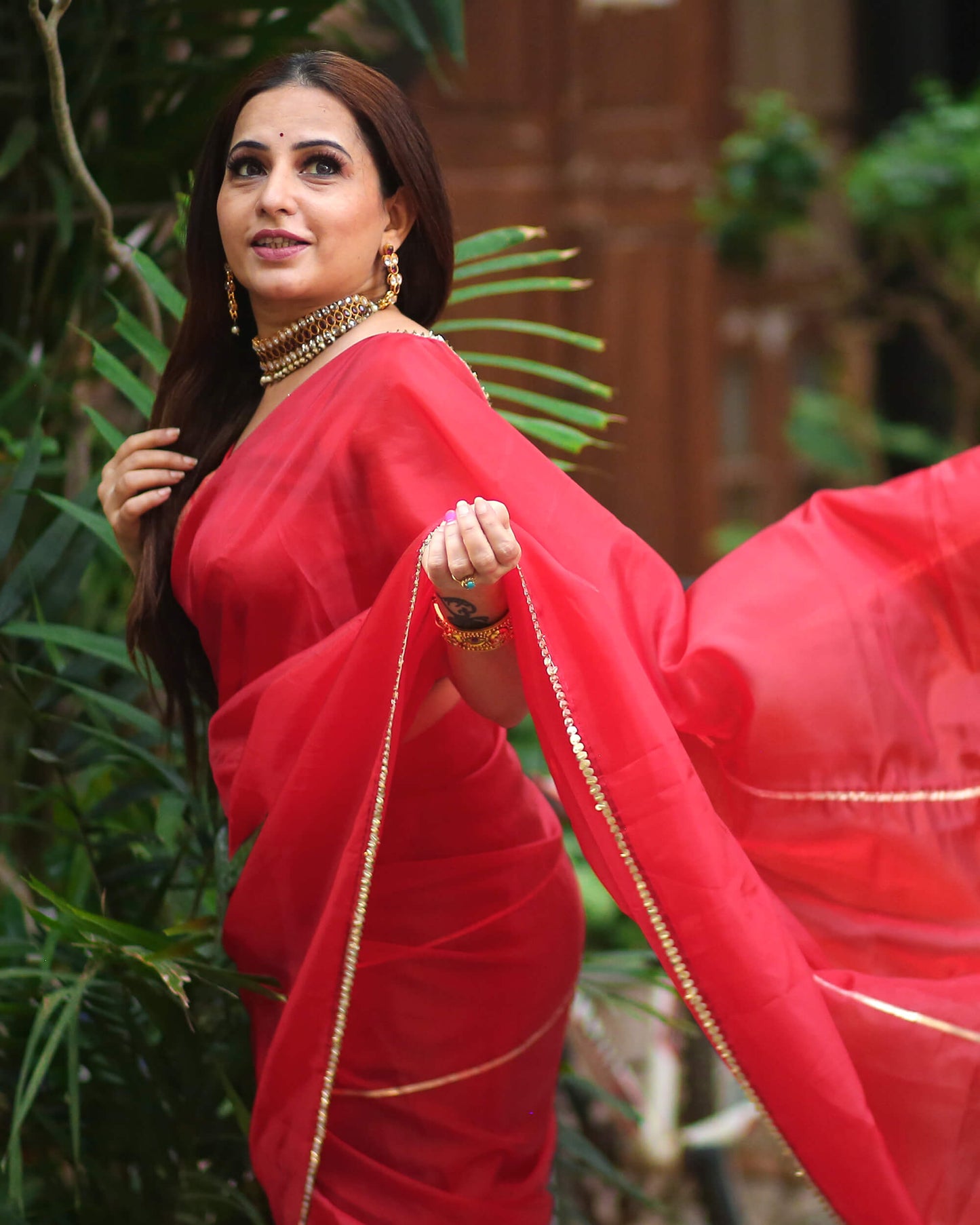 Mehogany Red Golden Zari Gotta Patti Work Liquid Organza Saree With Tubular Beads Sequins Lace Border.