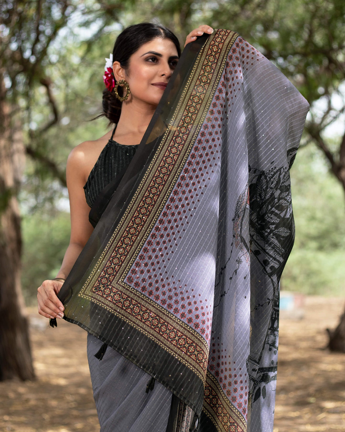 Independence Blue And Black Quirky Pattern Premium Sequins Georgette Saree With Tassels