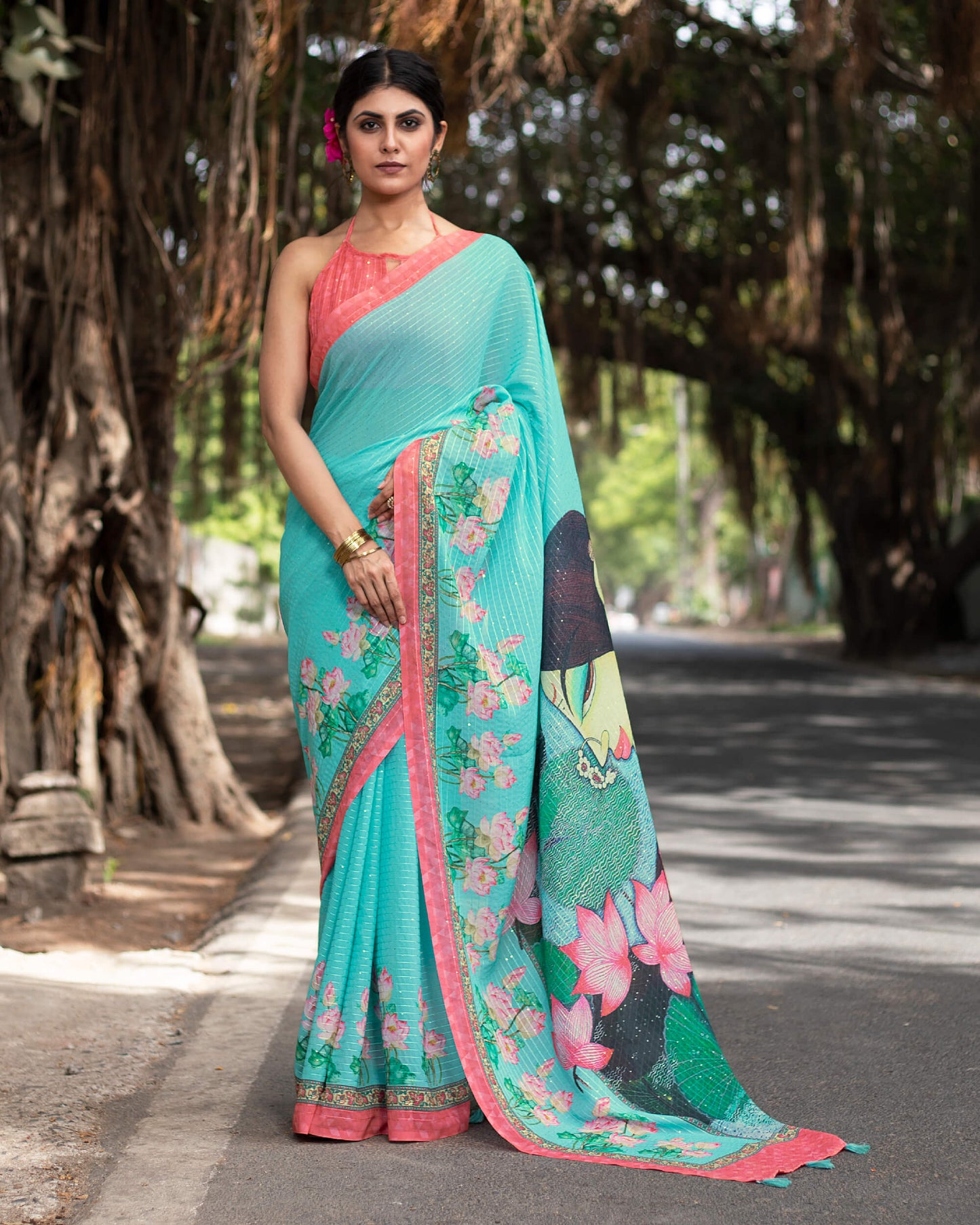Turquoise Blue And Pink Quirky Pattern Premium Sequins Georgette Saree With Tassels