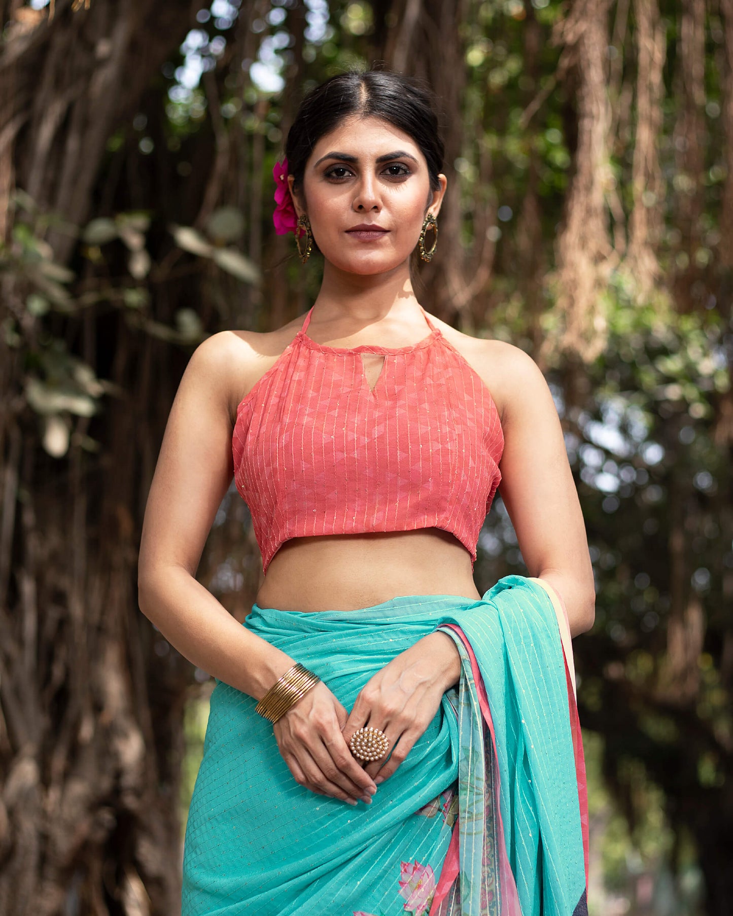 Turquoise Blue And Pink Quirky Pattern Premium Sequins Georgette Saree With Tassels