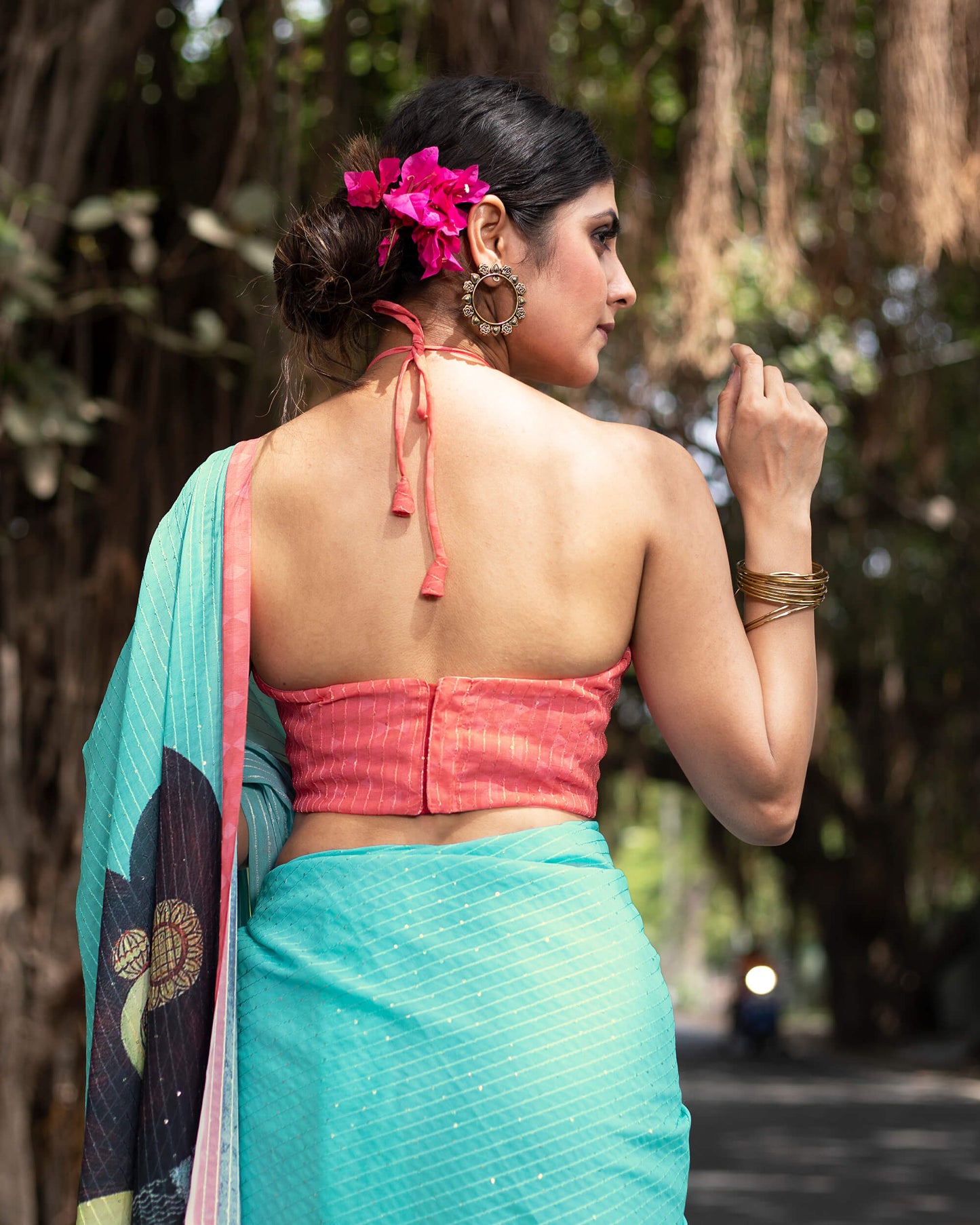 Turquoise Blue And Pink Quirky Pattern Premium Sequins Georgette Saree With Tassels