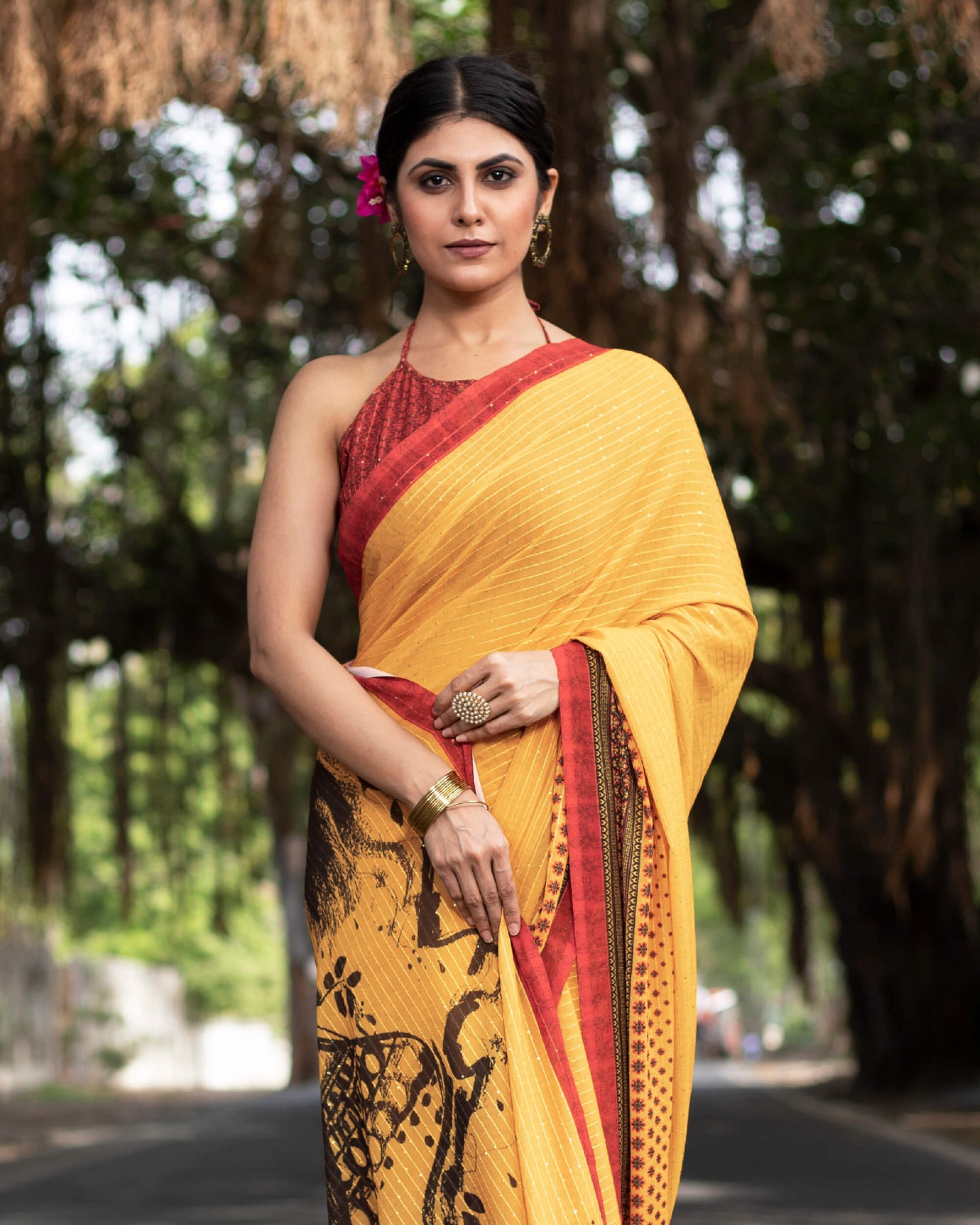 Merigold Yellow And Black Quirky Pattern Premium Sequins Georgette Saree With Tassels